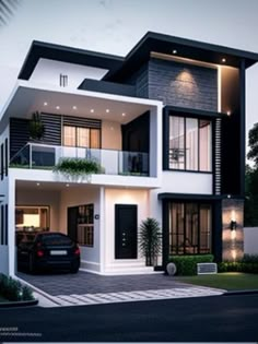 a two story house with black and white accents