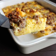 a casserole dish with sausage and cheese