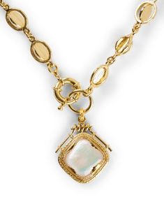 With design elements gathered from around the world, Gas Bijoux continues to create unique jewelry staples, and this Siena necklace is no exception. An intricately crafted 24k gold-plated brass chain holds an eye-catching stone reminiscent of a pearl. Showcase this piece with any open neckline to add a feminine touch to your look. Gold And Pearl Necklace, Jewelry Staples, Brass Chain, Siena, Design Elements, Pearl Necklace, Around The World, Plating, Brass