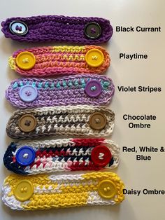 several crocheted headbands with buttons and names on the bottom one is labeled