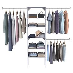 an open closet with clothes hanging on rails