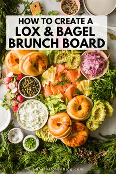 an assortment of food is laid out on a white counter top, including bagels and salads