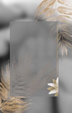 an abstract photo with gold and white feathers in the foreground, against a gray background