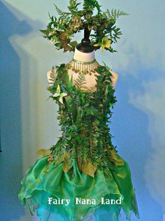 a dress made out of plants and leaves