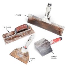 three different types of tools are shown in this image, including two trowels and one knife