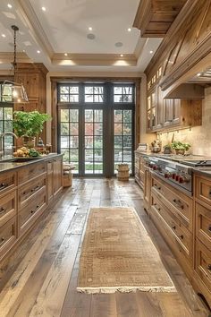 a large kitchen with wooden cabinets and an area rug on the floor in front of it