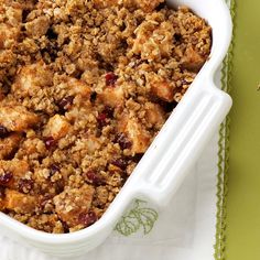 a casserole dish filled with cranberry crisp