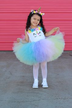 UNICORN tutu dress, tutu dress, unicorn birthday, rainbow tutu dress, pastel tutu, unicorn dress Pease leave the event date in the notes to seller and or message us to make sure your tutu arrives on time. We recommend ordering for events in enough time so that your tutu arrives a week early. Our UNICORN tutu dress is one of our newest designs. Perfect for any event, this dress is made on a crochet top and the front is covered with white velvet fabric. The front has a unicorn face. The skirt is k Unicorn Dresses For Kids, White Velvet Fabric, Rainbow Tutu Dress, Unicorn Tutu Dress, Crochet Tutu Dress, Feather Tutu, Toy Story Halloween, Crochet Tutu, Birthday Tutu Dress