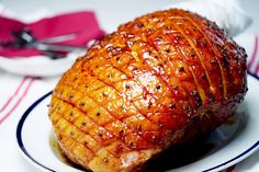 a piece of meat sitting on top of a white plate