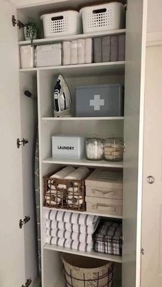 an open closet with baskets and other items on the shelves, labeled leanne's post