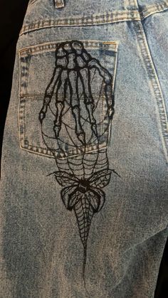 Skeleton hand, spider, sharpie, jeans, drawing Things To Draw On Jeans, Sharpie Jeans, Pants Painting Ideas, Spider Web Jeans, Spider Jeans, Drawing On Jeans, Clothes Flip, Goth Jeans, Avengers Dr