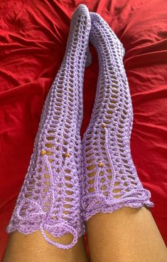 the legs are crocheted in purple yarn