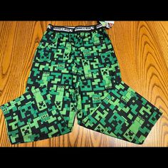 Perfect For Minecraft Fans! These Flame Resistant, Lightweight Pajama Pants For Boys Feature An All-Over Print With The Iconic Minecraft Creeper And Tnt In A Pixelated Pattern. Perfect Comfortable Clothes For Relaxing And Playing His Favorite Game! Elastic Waist, Pull On Styling. Green Long Pants For Bedtime, Minecraft Clothes, Minecraft Merch, Minecraft Outfits, Toddler Girls Leggings, Pants For Boys, Wishlist Ideas, Camo Jeans, Toddler Jeans