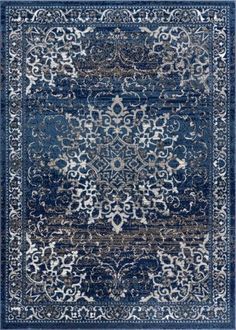 a blue rug with an ornate design on it