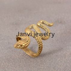 18k Gold snake ring,Snake Wrap Ring,adjustable snake ring,gold wrap ring,Gothic,Hippie,spiral ring,brass ring, Graduation Gift ,Vintage Ring Gemstone: -Na Jewelery Category:- Handmade Ring Metal:-Brass -- T H E * Q U A L I T Y We buy raw gemstones directly from miners and then get them cut and polished at our workshop , Therefore saving some bucks (additional added fees and markups) avoiding a middle man and making sure of the authenticity of the gems. And we use top quality materials that are w Gold Brass Snake Ring As Gift, Gold Brass Snake Ring For Gift, Gold Snake Ring As Gift, Brass Snake Ring Open Shape Gift, Brass Snake Ring Open Design For Gift, Brass Open Snake Ring Gift, Handmade Gold Snake Ring, Vintage Gold Snake Ring Gift, Unique Gold Snake-shaped Rings