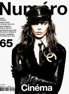 the cover of numerro magazine with a woman wearing a hat and leather jacket