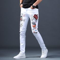 White Slim Fit Bottoms For Spring, White Slim Fit Straight Leg Pants, Trendy Slim Fit Bottoms For Streetwear, Stretch Cotton Jeans For Streetwear, White Slim Fit Casual Pants, White Slim Fit Bottoms For Summer, Fitted White Jeans With Five Pockets, White Stretch Jeans For Summer, White Stretch Jeans For Spring