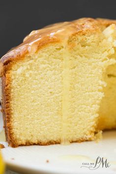 a close up of a cake on a plate with a slice missing from the cake