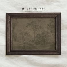 a painting hanging on the wall in front of a white sheet that says in cotton art