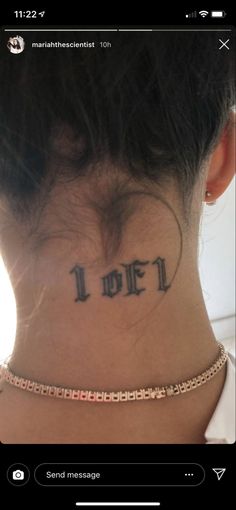 a woman's neck with the words i love you tattooed on her left side