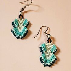 Dangle Earrings  🌷 Made by the artist: Unknown  EARRINGS Beadwork  Hooks Handmade Native Beadwork Earrings, Traditional Turquoise Beaded Earrings For Festivals, Traditional Dangle Jewelry With Bead Caps, Bohemian Drop Earrings With Bead Caps, Bohemian Dangle Jewelry With Bead Caps, Traditional Green Jewelry With Bead Caps, Adjustable Bohemian Earrings With Bead Caps, Traditional Turquoise Teardrop Beaded Earrings, Bohemian Bead Caps Earrings For Festival