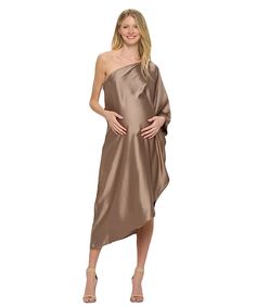 This absolutely stunning oversized asymmetrical one-shoulder dress is perfect for moms-to-be at all stages of pregnancy; including postpartum! Turn heads in this classy yet cool-mom fit this season at special events and holiday parties! Color: Satin Cocoa, Red 97% Polyester, 3% Spandex Sizes: XS/S (0-4), M/L (6-10), L/XL (12-18) Questions? Use the chat icon to connect with a stylist! Pregnant Cocktail Dress, Maternity Cocktail Dress, Brooke Taylor, Cocktail Dress Maternity, Chat Icon, White Maternity Dresses, Stages Of Pregnancy, Work Skirts, Pregnancy Stages