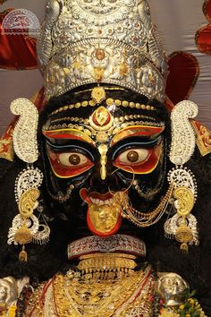 an elaborately decorated mask is displayed on display