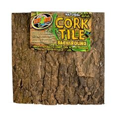 the bark of a tree has a label on it that says cork tile background with an image of a lizard