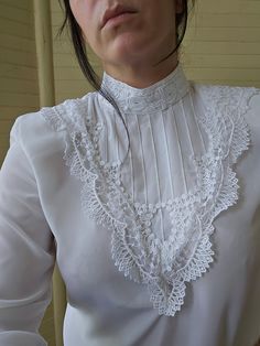 Elegant Lace Patchwork Blouse For Daywear, Elegant Blouse With Lace Trim And Ruffled Collar, Lace Collar Top For Daywear In Fall, Formal Blouse With Lace Trim And Ruffled Collar, Fall Lace Top With Lace Collar For Daywear, Elegant Long Sleeve Lace Top With Ruffles, Formal Fall Lace Top With Lace Trim, Formal Lace Top With Lace Trim For Fall, Formal Fall Lace Top