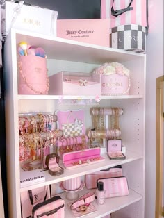 a display case filled with lots of pink items