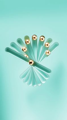 a group of green and gold toothbrushes on a blue background