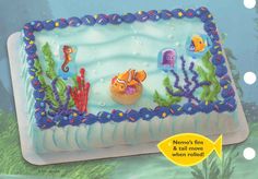 an image of a birthday cake with fish and sea animals on it's side