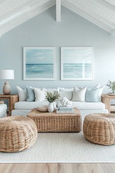 a living room with wicker furniture and pictures on the wall above it's windows