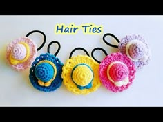 four crocheted hair ties are shown in different colors and sizes, with the words hair ties written above them