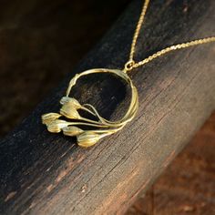 Birthday gift Gold twig pendant, Bohemian necklace, Brass banch necklace gold plated chain, Lapsana communis necklace, Botanical jewelry. This delicately woven Lapsana communis necklace was created on the basis of a natural branch. It is made of a good quality brass. The pendant is 3,8 cm (2.5 inches) long. The set includes a gold-plated sterling silver chain. You can choose the length of the chain. Each of them has a 5 cm (1.97 inches) extension. Available lengths: S: 40 cm - 15.75 inches  M: 50 cm - 19.69 inches L: 70 cm - 27.56 inches Your jewelry will arrive elegantly packaged within a charming gift box. Matching earrings available here: https://www.etsy.com/listing/1500633546/twig-hoop-earrings-branches-and-leaves A true masterpiece of nature-inspired jewelry. Handcrafted with precisi Plants Jewelry, Twig Jewelry, Gold Twigs, Plant Jewelry, Rock Jewelry, Botanical Jewelry, Bohemian Necklace, Jewelry Lookbook, Nature Inspired Jewelry