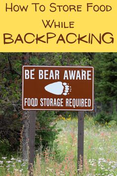 a sign that says, how to store food while backpacking be bear aware food storage required