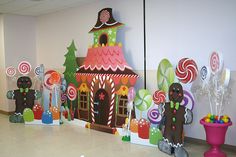 some candy houses are on display in an office