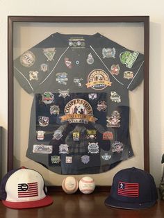 a baseball cap and hat display in a shadow box