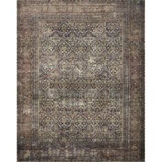 an antique rug with many different colors and patterns on the carpet, including brown, blue,