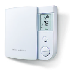 thermostaer is mounted on the wall, displaying the temperature and humidity levels