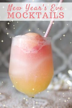 a pink and yellow drink in a glass with a straw sticking out of the top