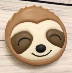 a cookie with a slotty face on it