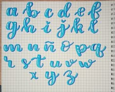 some type of writing that is written on a piece of paper with blue marker pens