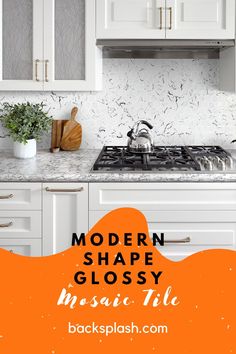 the modern shape glossy mosaic tile backsplash is perfect for this white kitchen