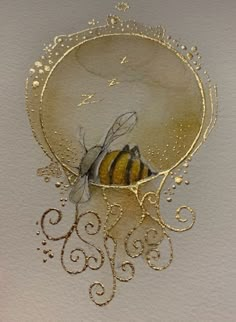 a drawing of a bee in a gold frame