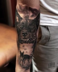 a man with a dog tattoo on his arm