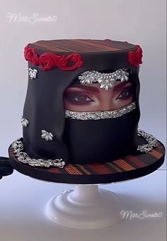 there is a cake with a woman's face on it