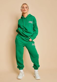 Green Athletics Jogger Casual cutie, our Lola Green Athletics Jogger is an essential piece for the cosy, chilled days. Featuring a pink printed slogan detail and a loose fit. Style with the matching hoodie for a full tracksuit. Matching Jogger Set Outfit, Green Joggers Outfit, Canada Outfits, Green Tracksuit, Full Tracksuit, Green Joggers, Joggers Outfit, Joggers Womens, Jogger Set