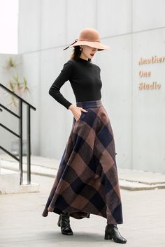 "This winter wool skirt is a classic piece of tailoring that will see you through rain or shine. It is cut with a flattering flared skirt to give you a wonderful shape. The winter skirt is perfect classic styling and ends at the ankle. This is a versatile skirt that you'll wear again and again. DETAILS: * 30% wool, 30% fiber, 40% polyester * fully satiny liner * Two side pockets * Right zip closure * Back elastic, comfortable wear * Plus size full skirt * Ankle length skirt * Perfect for Winter, Winter Wool Skirt, Warm Skirt, Wool Maxi Skirt, Long Wool Skirt, Maxi Skirt Winter, Warm Skirts, Long Linen Skirt, Spring Skirt Outfits, Chiffon White Dress