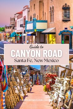 the streets and shops in canyon road, santa fe new mexico with text overlay that reads guide to canyon road